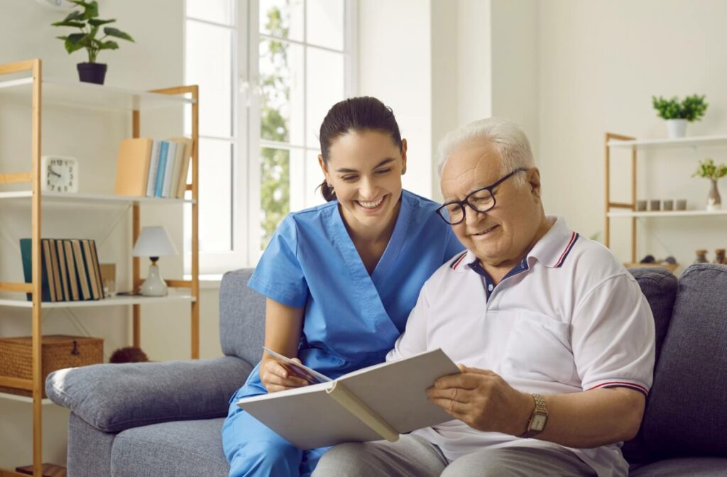 A mature adult embracing their loved one in memory care.