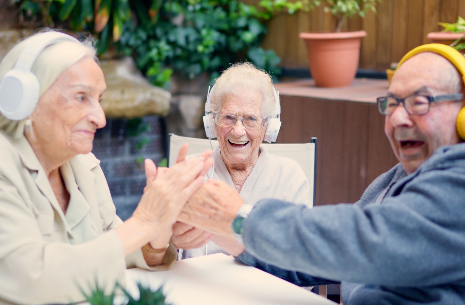 seniors listening to music together as an activity in memory care